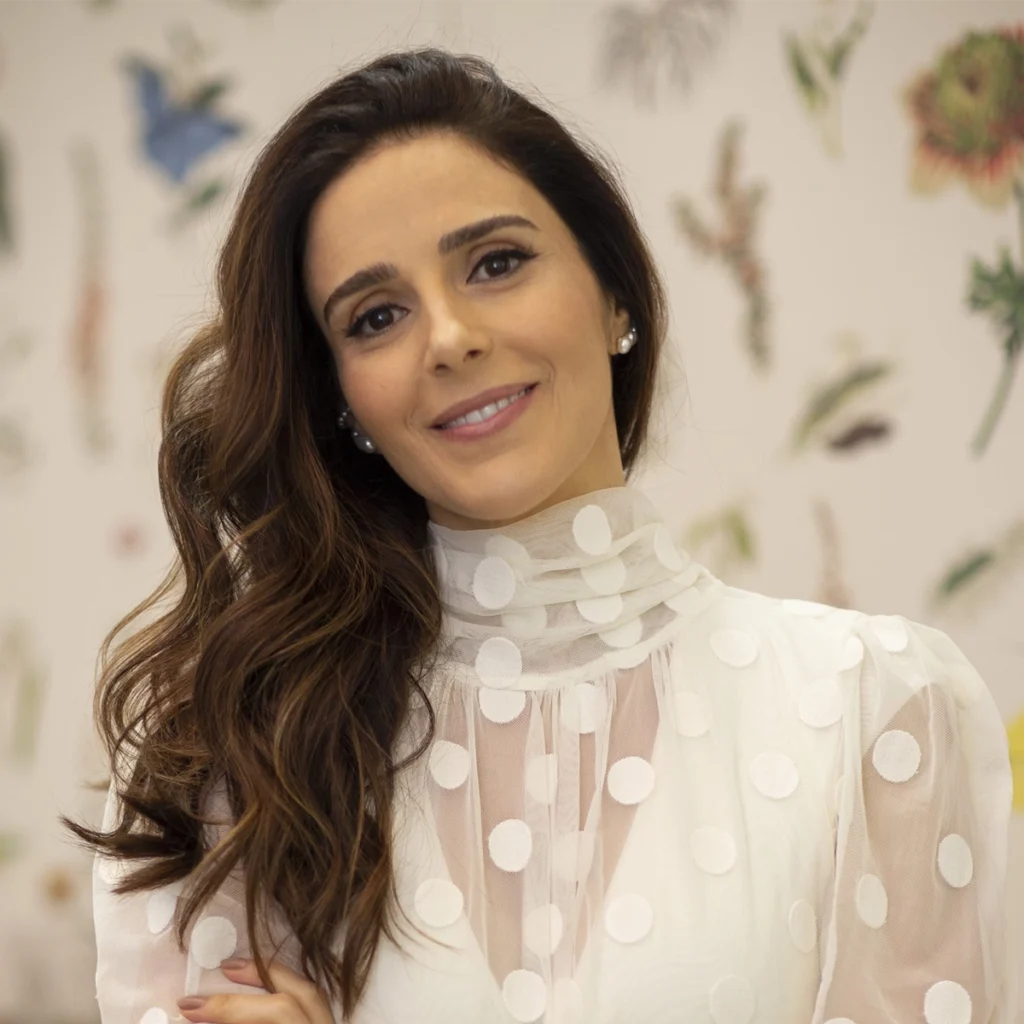 Real photo of Dr. Bianca Viscomi smiling at the camera.